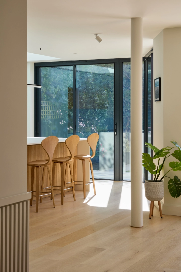 architect-detail-hero-biofold-kitchen-stools-Sky-blue-house